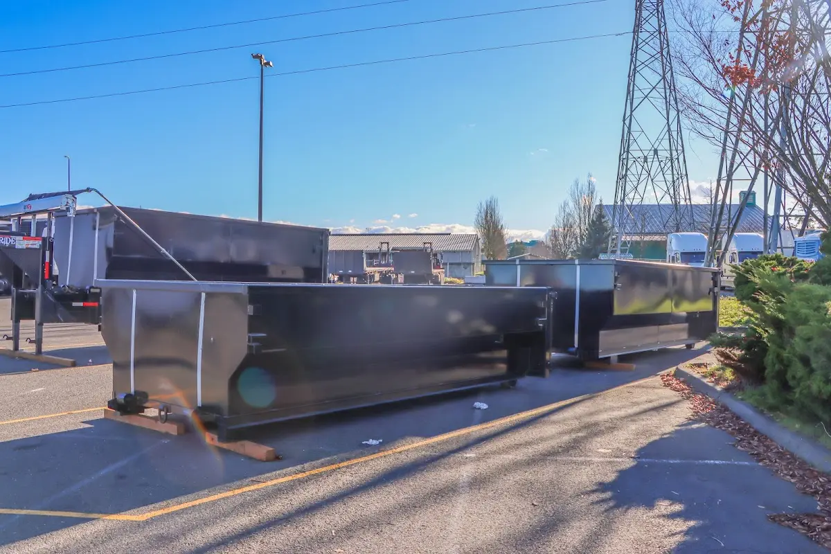 Roll-off dumpster ready for waste disposal at job site for 6 Yard Dumpster Rental in Coffeyville